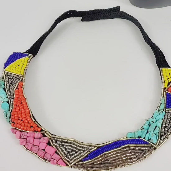 Crochet based embroidery necklace with seed and bugle beads, sequins and semiprecious gemstones.