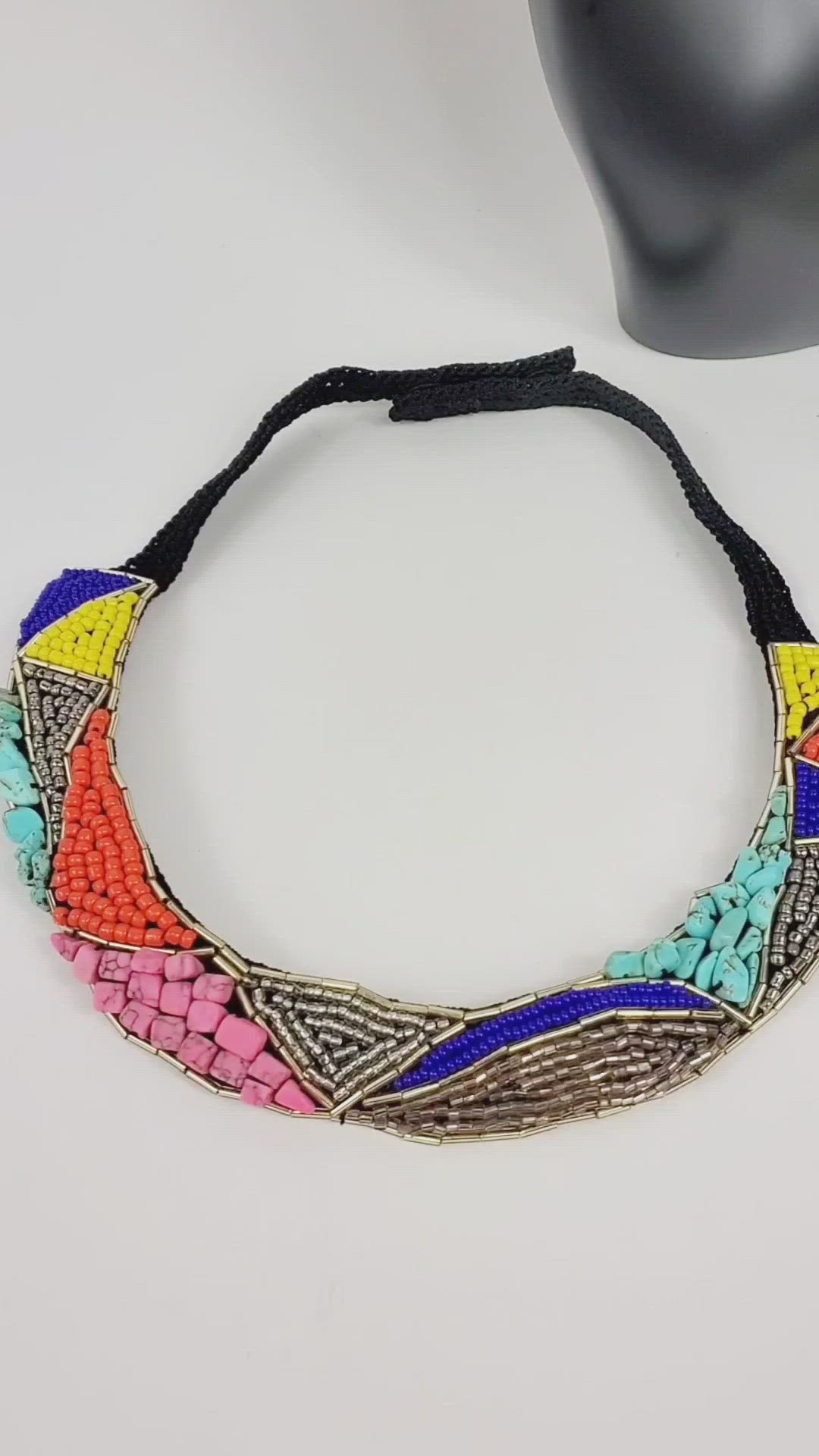 Crochet based embroidery necklace with seed and bugle beads, sequins and semiprecious gemstones.